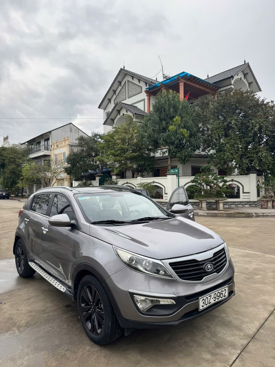Kia Sportage Limited 2.0 AT 2010 - Ngoại thất 1